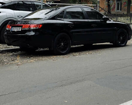 Черный Хендай Грандер, объемом двигателя 3.3 л и пробегом 165 тыс. км за 7990 $, фото 1 на Automoto.ua