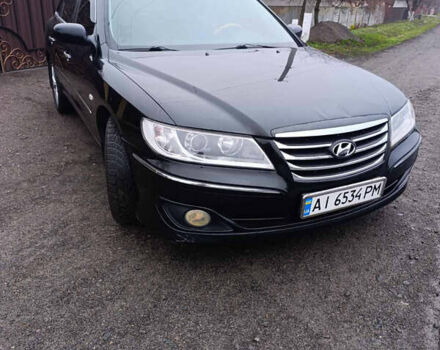 Черный Хендай Грандер, объемом двигателя 3.34 л и пробегом 240 тыс. км за 5500 $, фото 1 на Automoto.ua