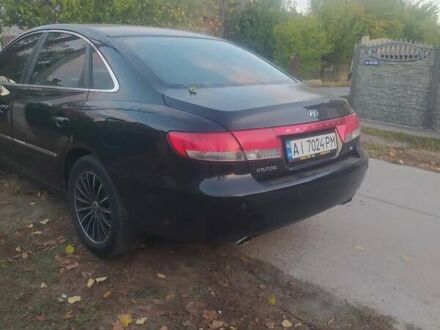 Хендай Грандер 2008 у Харкові на Automoto.ua Чорний Хендай Грандер, об'ємом двигуна 3.34 л та пробігом 333 тис. км за 7500 $, фото 1 на Automoto.ua