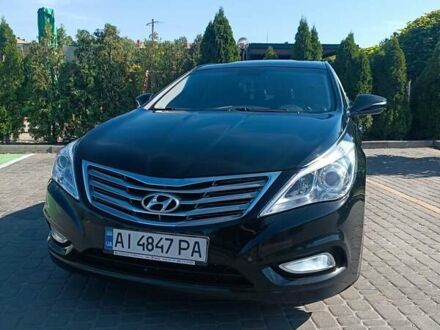 Черный Хендай Грандер, объемом двигателя 3 л и пробегом 170 тыс. км за 12500 $, фото 1 на Automoto.ua