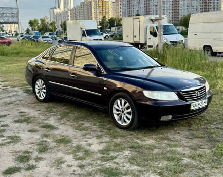 Коричневий Хендай Грандер, об'ємом двигуна 3.3 л та пробігом 225 тис. км за 3850 $, фото 1 на Automoto.ua