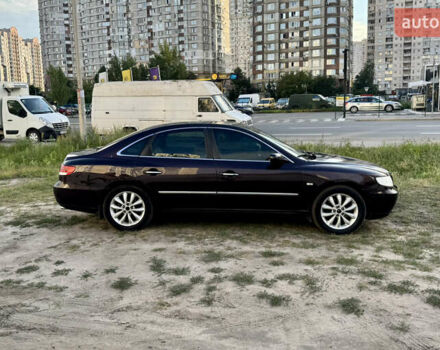 Коричневий Хендай Грандер, об'ємом двигуна 3.3 л та пробігом 225 тис. км за 3850 $, фото 2 на Automoto.ua
