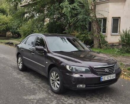 Красный Хендай Грандер, объемом двигателя 3.34 л и пробегом 243 тыс. км за 4000 $, фото 6 на Automoto.ua