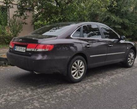 Красный Хендай Грандер, объемом двигателя 3.34 л и пробегом 243 тыс. км за 4000 $, фото 7 на Automoto.ua