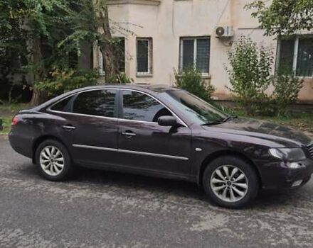 Красный Хендай Грандер, объемом двигателя 3.34 л и пробегом 243 тыс. км за 4000 $, фото 4 на Automoto.ua