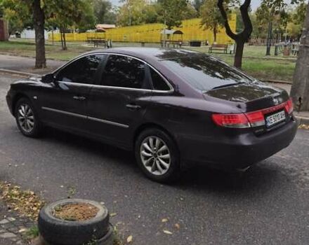 Красный Хендай Грандер, объемом двигателя 3.34 л и пробегом 243 тыс. км за 4000 $, фото 5 на Automoto.ua