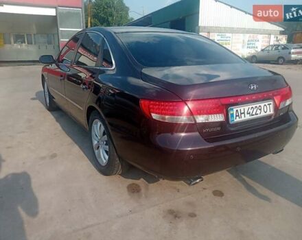 Красный Хендай Грандер, объемом двигателя 3.34 л и пробегом 243 тыс. км за 3500 $, фото 3 на Automoto.ua