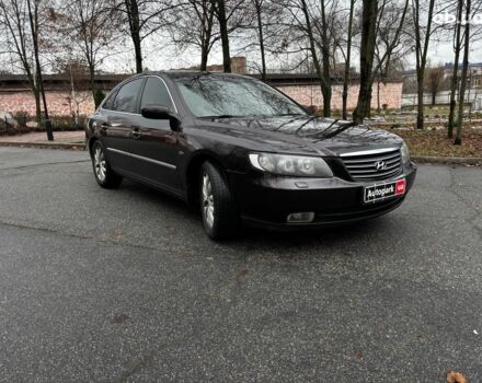 Червоний Хендай Грандер, об'ємом двигуна 3.3 л та пробігом 246 тис. км за 7490 $, фото 2 на Automoto.ua