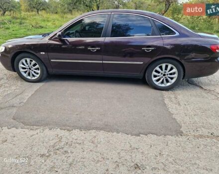 Красный Хендай Грандер, объемом двигателя 3.34 л и пробегом 289 тыс. км за 4600 $, фото 7 на Automoto.ua