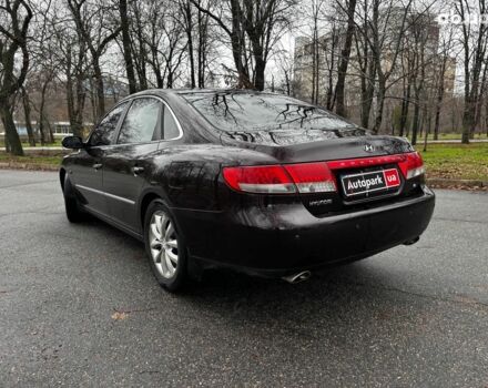 Червоний Хендай Грандер, об'ємом двигуна 3.3 л та пробігом 246 тис. км за 7490 $, фото 4 на Automoto.ua