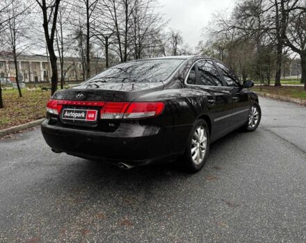 Красный Хендай Грандер, объемом двигателя 3.3 л и пробегом 246 тыс. км за 5990 $, фото 4 на Automoto.ua