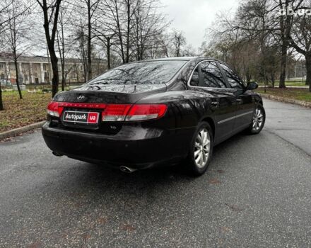 Червоний Хендай Грандер, об'ємом двигуна 3.3 л та пробігом 246 тис. км за 7490 $, фото 6 на Automoto.ua