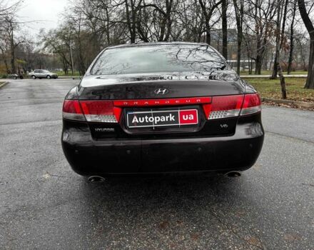 Красный Хендай Грандер, объемом двигателя 3.3 л и пробегом 246 тыс. км за 5990 $, фото 3 на Automoto.ua