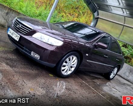 Червоний Хендай Грандер, об'ємом двигуна 3.3 л та пробігом 280 тис. км за 6500 $, фото 7 на Automoto.ua