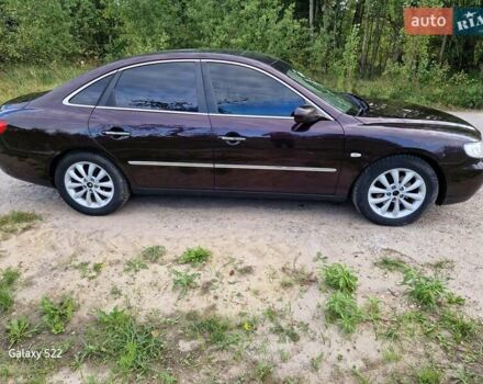 Красный Хендай Грандер, объемом двигателя 3.34 л и пробегом 289 тыс. км за 4600 $, фото 8 на Automoto.ua