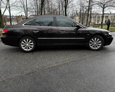 Красный Хендай Грандер, объемом двигателя 3.3 л и пробегом 246 тыс. км за 5990 $, фото 5 на Automoto.ua