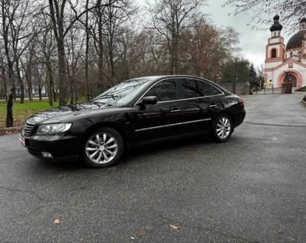 Красный Хендай Грандер, объемом двигателя 3.3 л и пробегом 246 тыс. км за 5990 $, фото 1 на Automoto.ua