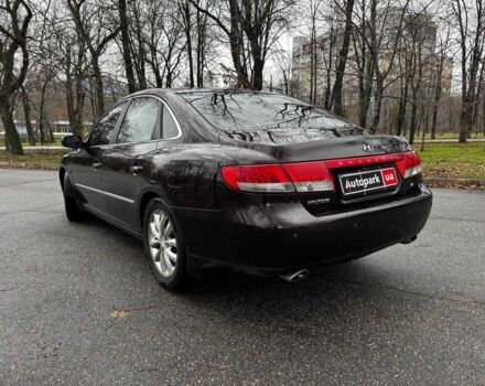 Красный Хендай Грандер, объемом двигателя 3.3 л и пробегом 246 тыс. км за 5990 $, фото 2 на Automoto.ua