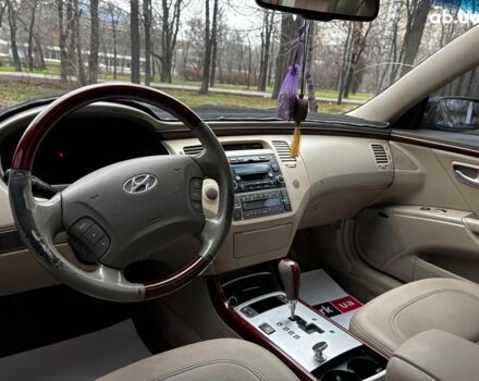 Червоний Хендай Грандер, об'ємом двигуна 3.3 л та пробігом 246 тис. км за 7490 $, фото 16 на Automoto.ua