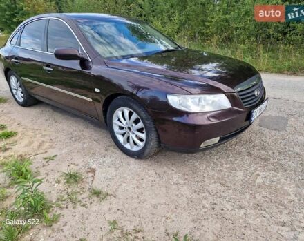 Красный Хендай Грандер, объемом двигателя 3.34 л и пробегом 289 тыс. км за 4600 $, фото 6 на Automoto.ua