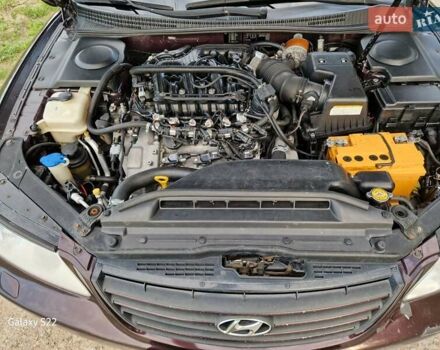 Красный Хендай Грандер, объемом двигателя 3.34 л и пробегом 289 тыс. км за 4600 $, фото 10 на Automoto.ua