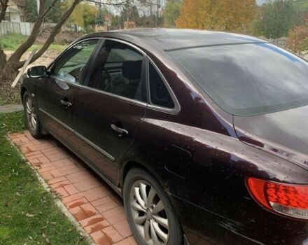 Красный Хендай Грандер, объемом двигателя 3.3 л и пробегом 400 тыс. км за 5000 $, фото 3 на Automoto.ua