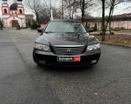 Червоний Хендай Грандер, об'ємом двигуна 3.3 л та пробігом 246 тис. км за 7490 $, фото 1 на Automoto.ua