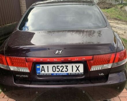 Красный Хендай Грандер, объемом двигателя 3.3 л и пробегом 400 тыс. км за 5000 $, фото 1 на Automoto.ua