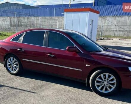 Красный Хендай Грандер, объемом двигателя 3.34 л и пробегом 304 тыс. км за 6700 $, фото 2 на Automoto.ua