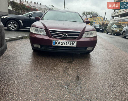 Красный Хендай Грандер, объемом двигателя 3.3 л и пробегом 187 тыс. км за 5400 $, фото 1 на Automoto.ua