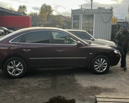 Красный Хендай Грандер, объемом двигателя 3.3 л и пробегом 345 тыс. км за 7000 $, фото 3 на Automoto.ua