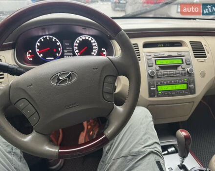 Красный Хендай Грандер, объемом двигателя 3.3 л и пробегом 187 тыс. км за 5400 $, фото 5 на Automoto.ua