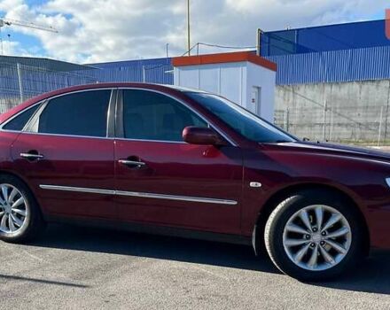 Красный Хендай Грандер, объемом двигателя 3.34 л и пробегом 304 тыс. км за 6700 $, фото 1 на Automoto.ua