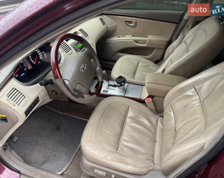 Красный Хендай Грандер, объемом двигателя 3.3 л и пробегом 187 тыс. км за 5400 $, фото 6 на Automoto.ua