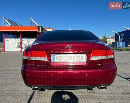 Красный Хендай Грандер, объемом двигателя 3.34 л и пробегом 304 тыс. км за 6700 $, фото 4 на Automoto.ua