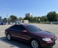 Червоний Хендай Грандер, об'ємом двигуна 3.3 л та пробігом 334 тис. км за 6199 $, фото 2 на Automoto.ua