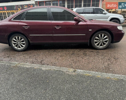 Красный Хендай Грандер, объемом двигателя 3.3 л и пробегом 187 тыс. км за 5400 $, фото 3 на Automoto.ua