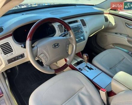Красный Хендай Грандер, объемом двигателя 3.34 л и пробегом 304 тыс. км за 6700 $, фото 5 на Automoto.ua