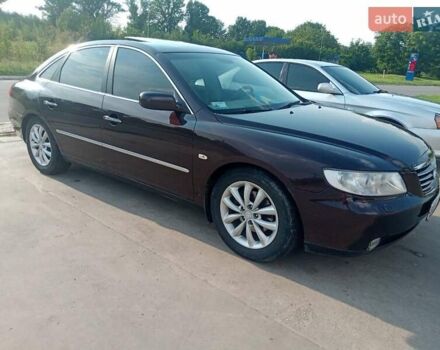 Красный Хендай Грандер, объемом двигателя 3.34 л и пробегом 243 тыс. км за 3500 $, фото 1 на Automoto.ua