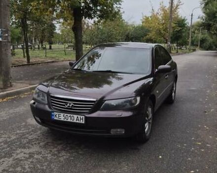 Красный Хендай Грандер, объемом двигателя 3.34 л и пробегом 243 тыс. км за 4000 $, фото 1 на Automoto.ua