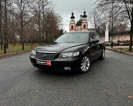 Красный Хендай Грандер, объемом двигателя 3.3 л и пробегом 246 тыс. км за 7490 $, фото 1 на Automoto.ua