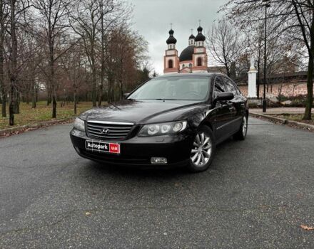 Красный Хендай Грандер, объемом двигателя 3.3 л и пробегом 246 тыс. км за 5990 $, фото 1 на Automoto.ua