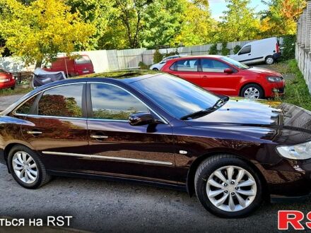 Червоний Хендай Грандер, об'ємом двигуна 3.3 л та пробігом 280 тис. км за 6500 $, фото 1 на Automoto.ua