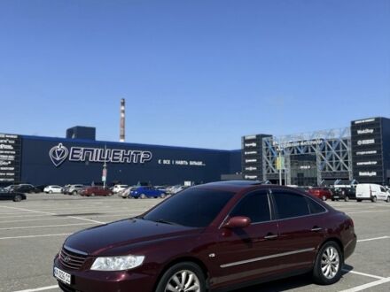 Червоний Хендай Грандер, об'ємом двигуна 3.3 л та пробігом 345 тис. км за 7000 $, фото 1 на Automoto.ua