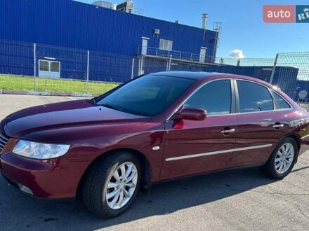 Красный Хендай Грандер, объемом двигателя 3.34 л и пробегом 304 тыс. км за 6700 $, фото 1 на Automoto.ua