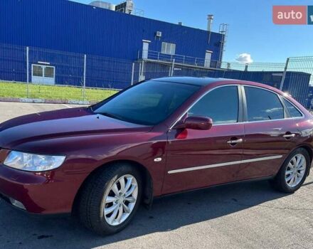 Красный Хендай Грандер, объемом двигателя 3.34 л и пробегом 304 тыс. км за 6700 $, фото 1 на Automoto.ua