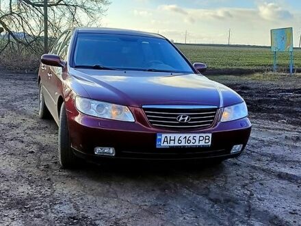 Хендай Грандер 2008 у Краматорске на Automoto.ua Червоний Хендай Грандер, об'ємом двигуна 3.3 л та пробігом 177 тис. км за 6600 $, фото 1 на Automoto.ua