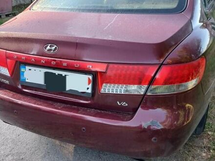 Хендай Грандер 2008 в Харькове на Automoto.ua Красный Хендай Грандер, объемом двигателя 3.3 л и пробегом 555 тыс. км за 5500 $, фото 1 на Automoto.ua