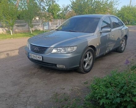 Серый Хендай Грандер, объемом двигателя 2.7 л и пробегом 280 тыс. км за 6700 $, фото 1 на Automoto.ua