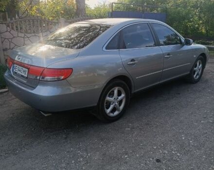 Серый Хендай Грандер, объемом двигателя 2.7 л и пробегом 280 тыс. км за 6700 $, фото 2 на Automoto.ua